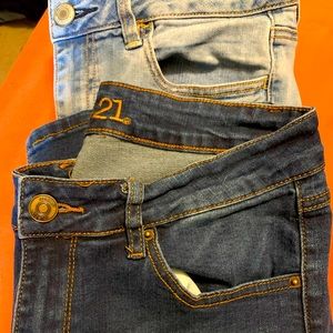 One pair of American Eagle jeans and one pair of Rue 21 jeans.